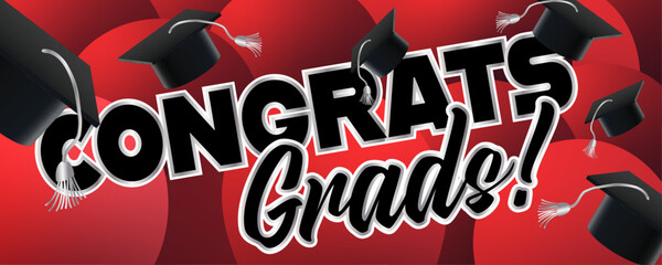 Black, Silver, and Red Graduation Sign. Very joyful graduation caps are tossed with red balloons in the background.