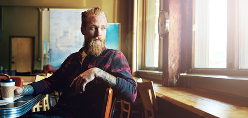 Man, hipster and coffee shop with relax thinking for customer service, caffeine or restaurant. Male...