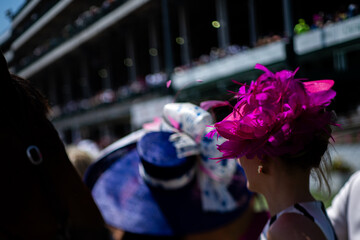 a large fancy horse racing hat	
