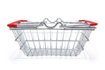 Wire empty shopping basket isolated on white background. Copy space.	
