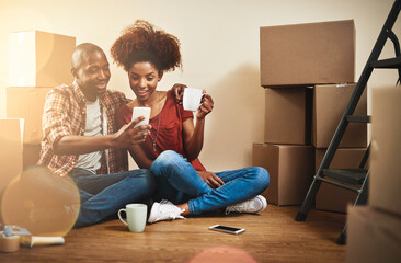 Couple, online and moving with phone in home to research property, app and reading mortgage info....