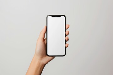 Woman Using a Smart Phone White Screen on a White Studio Backdrop. Close up Girl Hand Holding Mobile Phone Chroma Key Screen. Young Caucasian Female is Showing, WhiteScreen Phone. Mock-Up Display