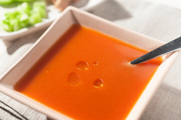 tomato soup gazpacho close up with spoon
