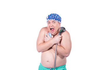 Funny fat man washes himself in the shower. White background. Morning routines and beauty care.