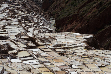 terraces with brackish water in the reserve called Salineras de Maras in the sacred valley