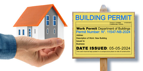 Building Permit concept with home model and placard with imaginary work permit - The document...