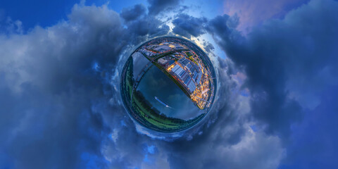 Industrial area, of Worms at Rhine river, evening aerial little planet