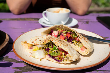 Pita with vegetables, mung bean sprouts and tofu cheese. Vegetarian food.