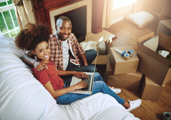 Sofa, laptop and portrait of couple in new house with smile for real estate, investment or mortgage...