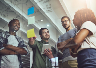 Obraz premium Business people, teamwork and sticky notes on glass wall for project planning, market research or ideas. Men, woman and thinking collaboration for creative startup or productivity, design or board