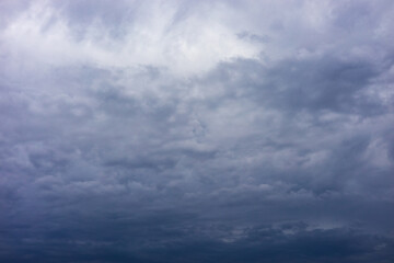 background in the form of a cloudy gray sky.