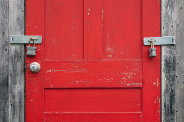 red door lock padlock wooden painted crackeling paint security private do not enter forbidden - Powered by Adobe
