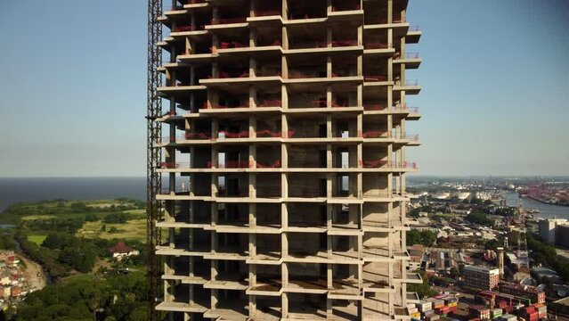 Construction site in Buenos Aires, Plaza de Mayo, tall modern skyscrapers rising in urban cityscape. Steel, concrete building structures, residential and commercial development in progress.