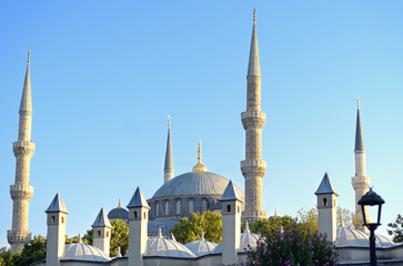 Blue Mosque - Sultan Ahmed Mosque - against a background of blue sky on a sunny day. Tourist attraction in Istanbul, Turkey.