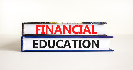 Financial education symbol. Concept words Financial education on beautiful books. Beautiful white paper background. Business Financial education concept. Copy space.
