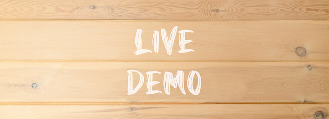 Live demo symbol. Concept words Live demo on beautiful wooden wall. Beautiful wooden wall...
