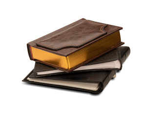 Stack of three photo albums isolated on a transparent background