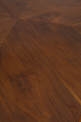 Walnut wood grain pattern. Natural material texture photograph. 