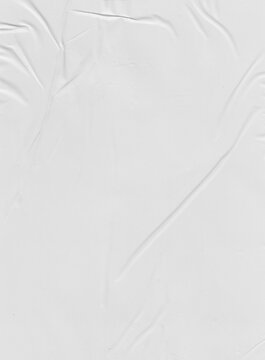 Papel amassado, dobrado e com rugas. &Aacute;specto envelhecido, antigo, vintage e retr&ocirc;. Fundo cor branca. Vazio em branco. Folhas e p&aacute;ginas. 