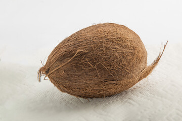 a coconut ready to make pina colada isolated on white