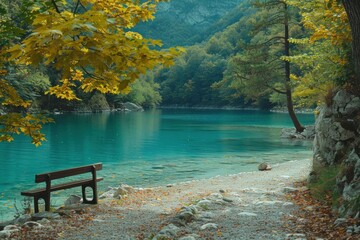 Obraz premium A bench sitting on the shore of a lake