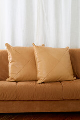 Warm tan leather throw pillows. Luxury handmade decor.
