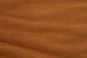 Vintage soft suede sofa. Mid-century modern couch. Close-up detail photograph.