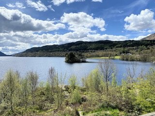 A view of Loch Lomond in Scotland on a sunny day