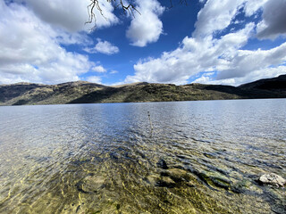 A view of Loch Lomond in Scotland on a sunny day
