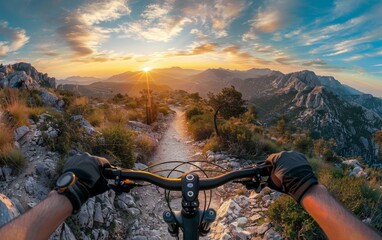 A person is riding a bike on a challenging rocky trail, navigating through the rugged terrain