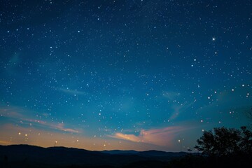 Fototapeta premium A night sky filled with stars shining through drifting clouds, A celestial sky with planets and constellations shimmering in the distance