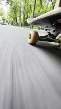  View under skateboard close up pov. Skateboard whell