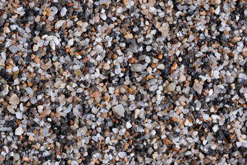 Close up of sand pebble texture for background. High quality photo.