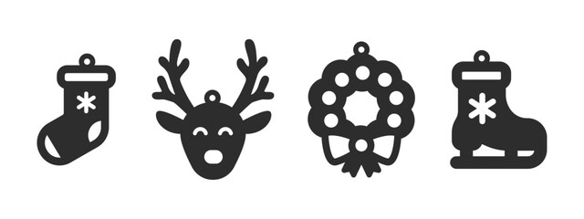 Set of Christmas designs for earrings, pendant or keychain with sock, reindeer, wreath and ice skates. Jewelry silhouette cut template. Laser cutting with leather, wood or metal. Vector stencils