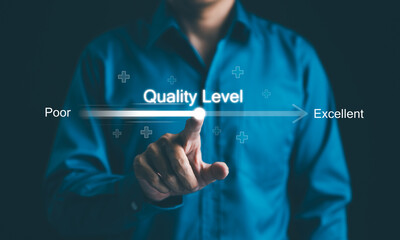 Concept of adjusting quality level from poor to excellent. A businessman adjusts a virtual quality...