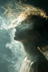 Profile portrait of a woman with ethereal misty smoke around her face