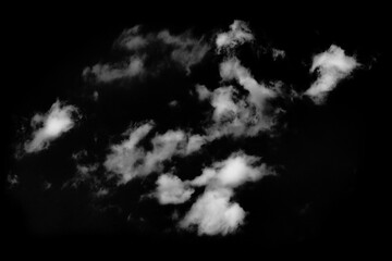 Fluffy clouds isolated on black background, extreme resolution