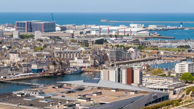 France, Manche, Cotentin, Cherbourg-Octeville, panoramic view of Hermione frigate in Bassin du Commerce, Chantereyne marina and main building of the Naval Group military submarine assembly yard