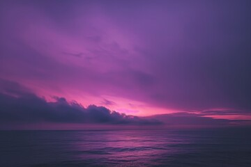 Purple sky over calm body of water, A dreamy purple gradient fading into darkness