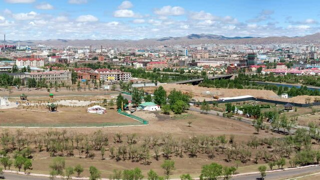 Mongolia, Ulan Bator, panoramic view of the city and the Tuul river from the Zaisan Memorial, tank commemorating the Second World War at the foot of the hill and Buddhist park for peace