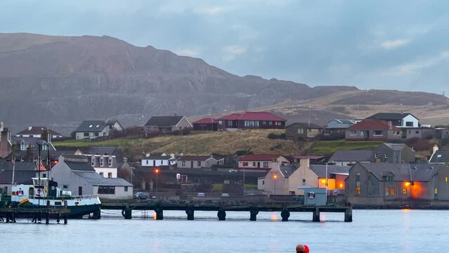 United Kingdom, Scotland, Shetland Islands, Mainland, Scalloway, panoramic view of the harbour at sunset