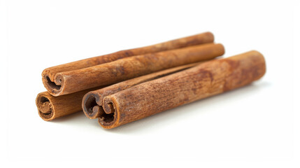 Close-up of three brown cinnamon sticks isolated on a white background 