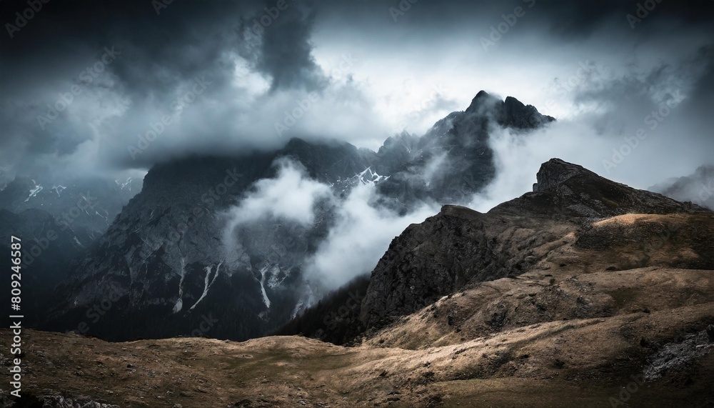 Poster dark mountains with heavy clouds