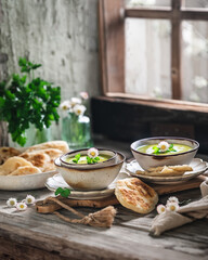 Green Pea Soup decorated with Edible Flowers and Pita Bread