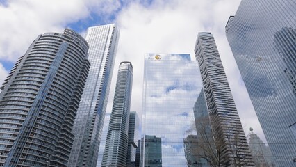 Obraz premium The ultra modern high-rise office buildings in the financial district of Toronto - TORONTO, CANADA - APRIL 15, 2024