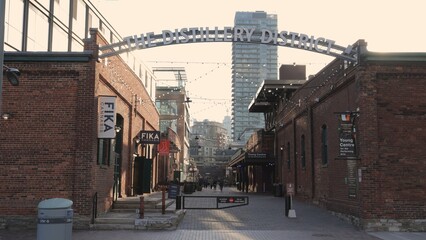 Naklejka premium The distillery district is a famous and popular place in the city of Toronto Old Town - TORONTO, CANADA - APRIL 15, 2024