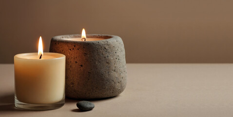 spa background with candles on empty beige table top