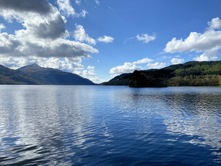 A view of Loch Lomond in Scotland on a sunny day