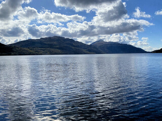 A view of Loch Lomond in Scotland on a sunny day