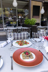 Foie gras,  goose liver pate, served on a plate in the restaurant